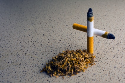 croix avec cigarettes pour arrêt tabac